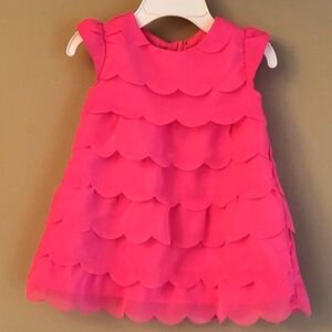 Super cute bright pink dress with scalloped layers